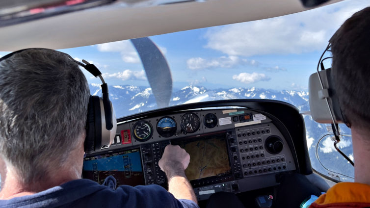 Here we're adjusting the autopilot to turn a a bit more to the left while passing over Snoqualmie Pass in Washington state. Katie Bailey photo